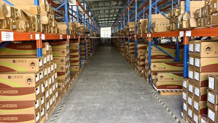 CAVIOSEN architectural interior film warehouse with organized rolls and export cartons